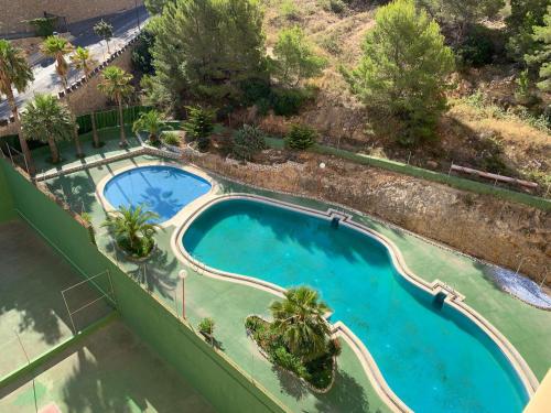 Utsikt mot bassenget på Cumbre Loix Apartment eller i nærheten