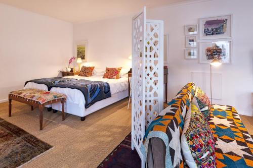 Кровать или кровати в номере The Vishuis