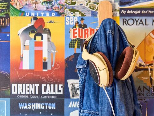 a pair of jeans hanging on a wall with a skateboard at hotelF1 Toulouse Aéroport in Blagnac