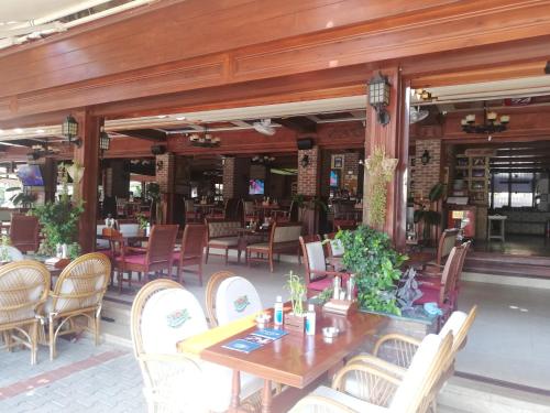 Restoranas ar kita vieta pavalgyti apgyvendinimo įstaigoje Havana Apart Hotel