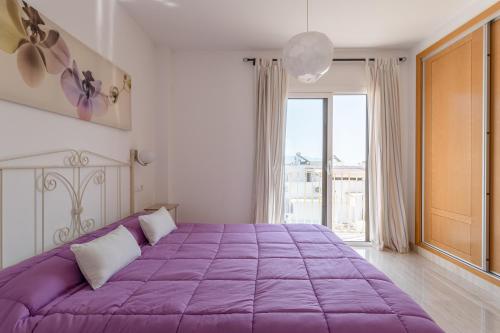 Posteľ alebo postele v izbe v ubytovaní Apartamento Corazón de Nerja
