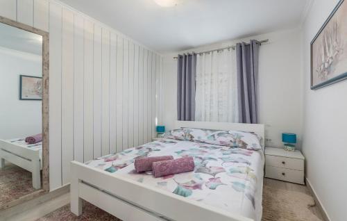 Postel nebo postele na pokoji v ubytování Holiday House Jurici