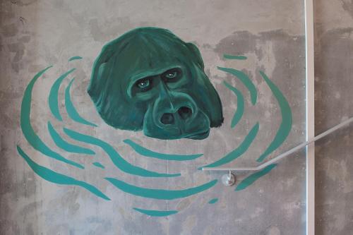 a painting of a gorilla on a wall at Eklo Bordeaux Centre Bastide in Bordeaux