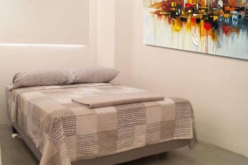 Cama o camas de una habitación en Remodeled Studio Apt in Guayaquil Centro wa View