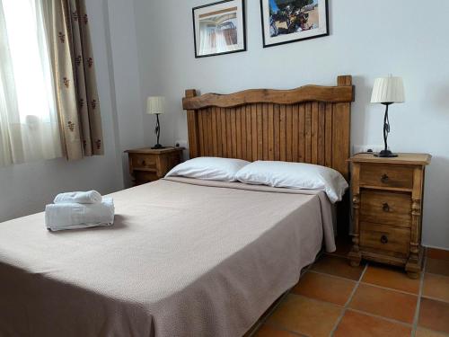 Arco - Virgen Apartamentos y Habitación