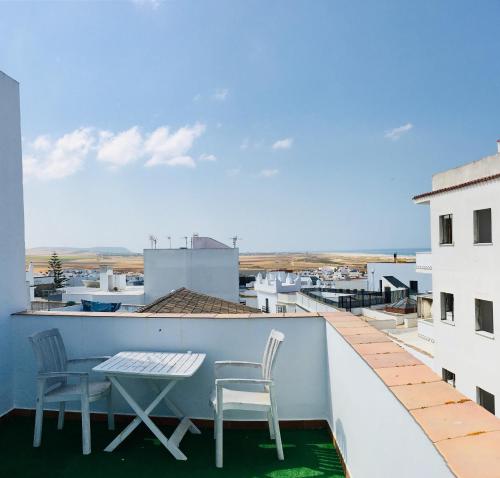 Arco - Virgen Apartamentos y Habitación