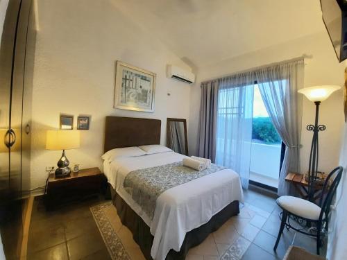 Postel nebo postele na pokoji v ubytování Casa Lara - Habitación cerca del mar - Homestay