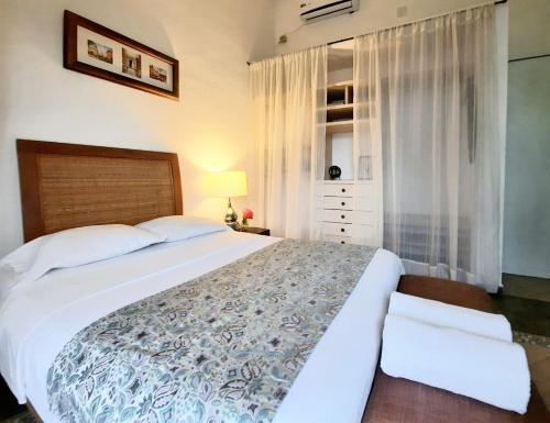 Postel nebo postele na pokoji v ubytování Casa Lara - Habitación cerca del mar - Homestay