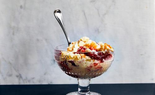 a dessert in a glass bowl with a spoon in it at Kimpton Hotel Fontenot by IHG in New Orleans