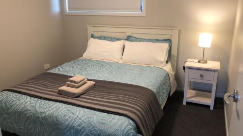 Llit o llits en una habitació de Central Stadium Apartments