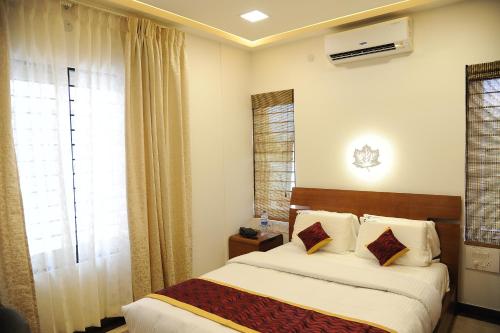 Ένα ή περισσότερα κρεβάτια σε δωμάτιο στο crystal inn