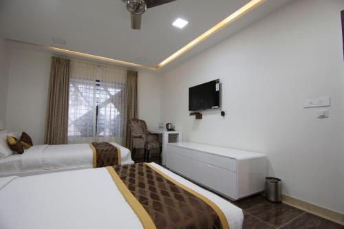 Ένα ή περισσότερα κρεβάτια σε δωμάτιο στο crystal inn