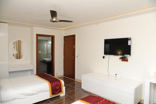 Ένα ή περισσότερα κρεβάτια σε δωμάτιο στο crystal inn