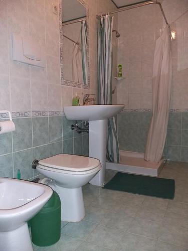 a bathroom with a sink and a toilet and a shower at B&B VRANSKO29-Room1960 in Vransko