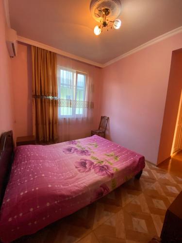 Postel nebo postele na pokoji v ubytování Beliy Dom