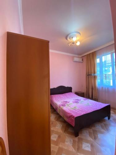 Postel nebo postele na pokoji v ubytování Beliy Dom