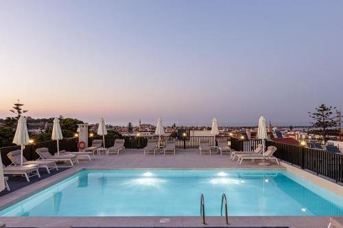 a pool on the roof of a hotel at Jo An Palace in Rethymno Town
