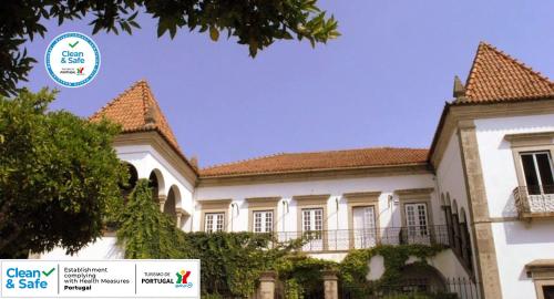 a house with a sign that says clarity sale at Casa de Nossa Senhora da Conceição in Gavião