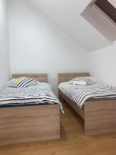 Postel nebo postele na pokoji v ubytování Nuit des étoiles gîte avec piscine et SPA communs