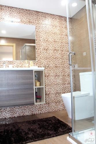 a bathroom with a shower and a toilet and a mirror at Quinta do Pombal - Douro - Camila's in Lamego