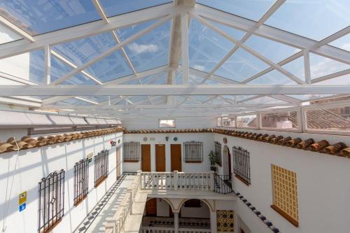 a view of a building with a glass ceiling at Hotel Los Omeyas in Córdoba