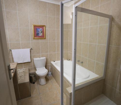 Koupelna v ubytování Bar-t-nique Guest House