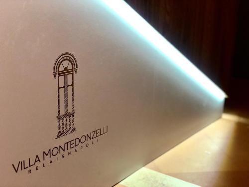 a close up of a book with a window on it at Relais Villa Montedonzelli in Naples
