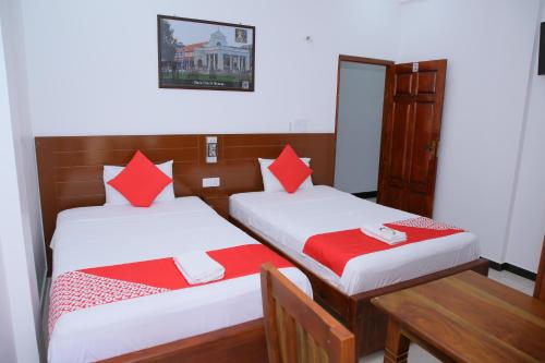Postel nebo postele na pokoji v ubytování Hotel Cedar