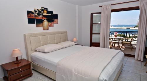 Кровать или кровати в номере Anna Maria - Vanessa Apartments