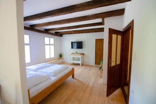 Postel nebo postele na pokoji v ubytování Villa Hardegg