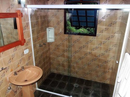 Ένα μπάνιο στο Hortensias Pousada Boutique - Piscina Aquecida 37 Graus e Fire Pit a Gas - Aceita PET