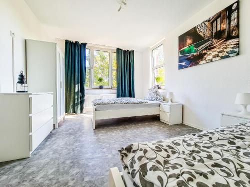 Ένα ή περισσότερα κρεβάτια σε δωμάτιο στο flat4short Dormagen