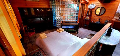 a bedroom with a large bed in a room at Chalet Santa Teresa - Ponferrada (El Bierzo, León) in Ponferrada