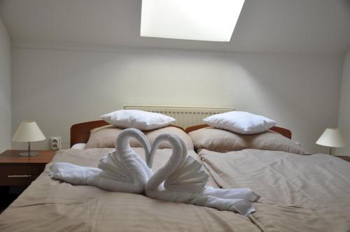 Posteľ alebo postele v izbe v ubytovaní Apartmán Panoráma Podhájska