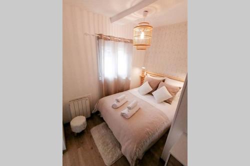 Ένα ή περισσότερα κρεβάτια σε δωμάτιο στο LE COCOON / PROCHE GARE / NETFLIX