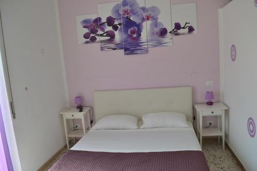 Postel nebo postele na pokoji v ubytování Sorrento Experience
