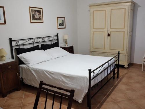 Postel nebo postele na pokoji v ubytování B&B L'Oliveto