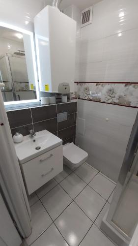 Kúpeľňa v ubytovaní Apartament w Centrum