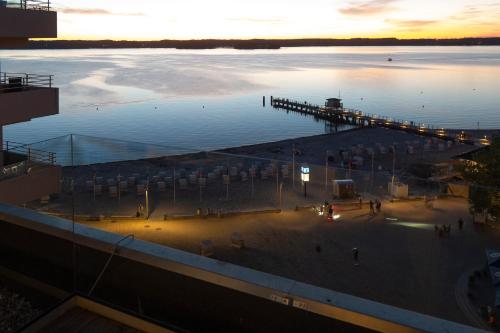 a view of a body of water with a pier at Intermar Hotel & Apartments in Glücksburg