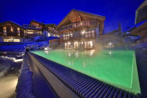 The swimming pool at or close to Mountains Hotel