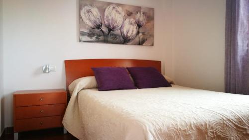 A bed or beds in a room at Urb Tortuga 1 Adults Recommended