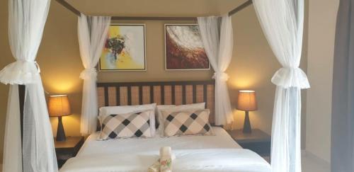 Ένα ή περισσότερα κρεβάτια σε δωμάτιο στο Gold Coast Rose Studio