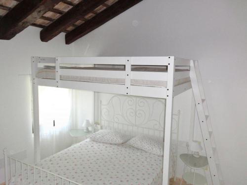 A bunk bed or bunk beds in a room at B&b Villa Bornancini