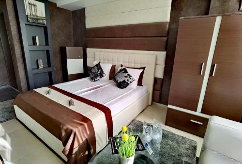 Postel nebo postele na pokoji v ubytování Hotel Acktion