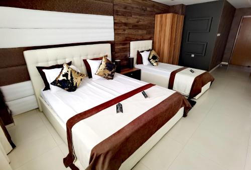 Postel nebo postele na pokoji v ubytování Hotel Acktion