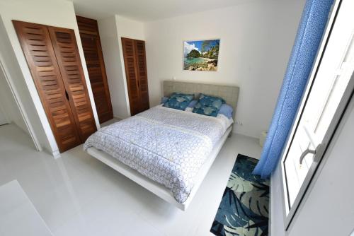 Postel nebo postele na pokoji v ubytování Eden Blue vue Mer