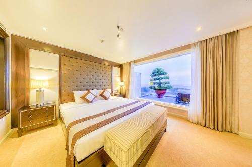 Giường trong phòng chung tại Sea Links Beach Resort & Golf