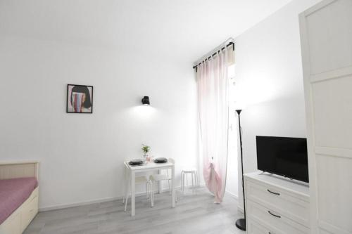 TV a/nebo společenská místnost v ubytování La Casa di Oreno