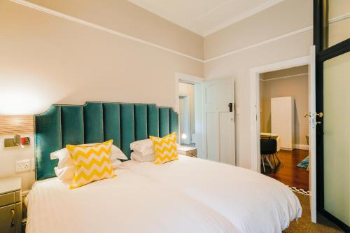 Katil atau katil-katil dalam bilik di Eendracht Apartments