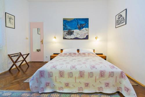 a bedroom with a large bed in a room at B&B Sesame Inn in Dubrovnik